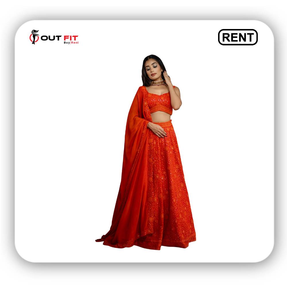 Discover the stunning Orange Embroidery Floral Bloom Lehenga Set on rent at Outfit Rental Shop in Bangalore. Perfect for weddings and special occasions.