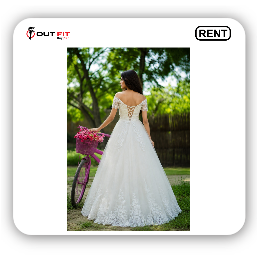 Stunning White Modern Bridal Elegant Wedding Wear on Rent in Bangalore (3) Close-up of intricate embroidery on white modern bridal elegant wedding wear available for rent.