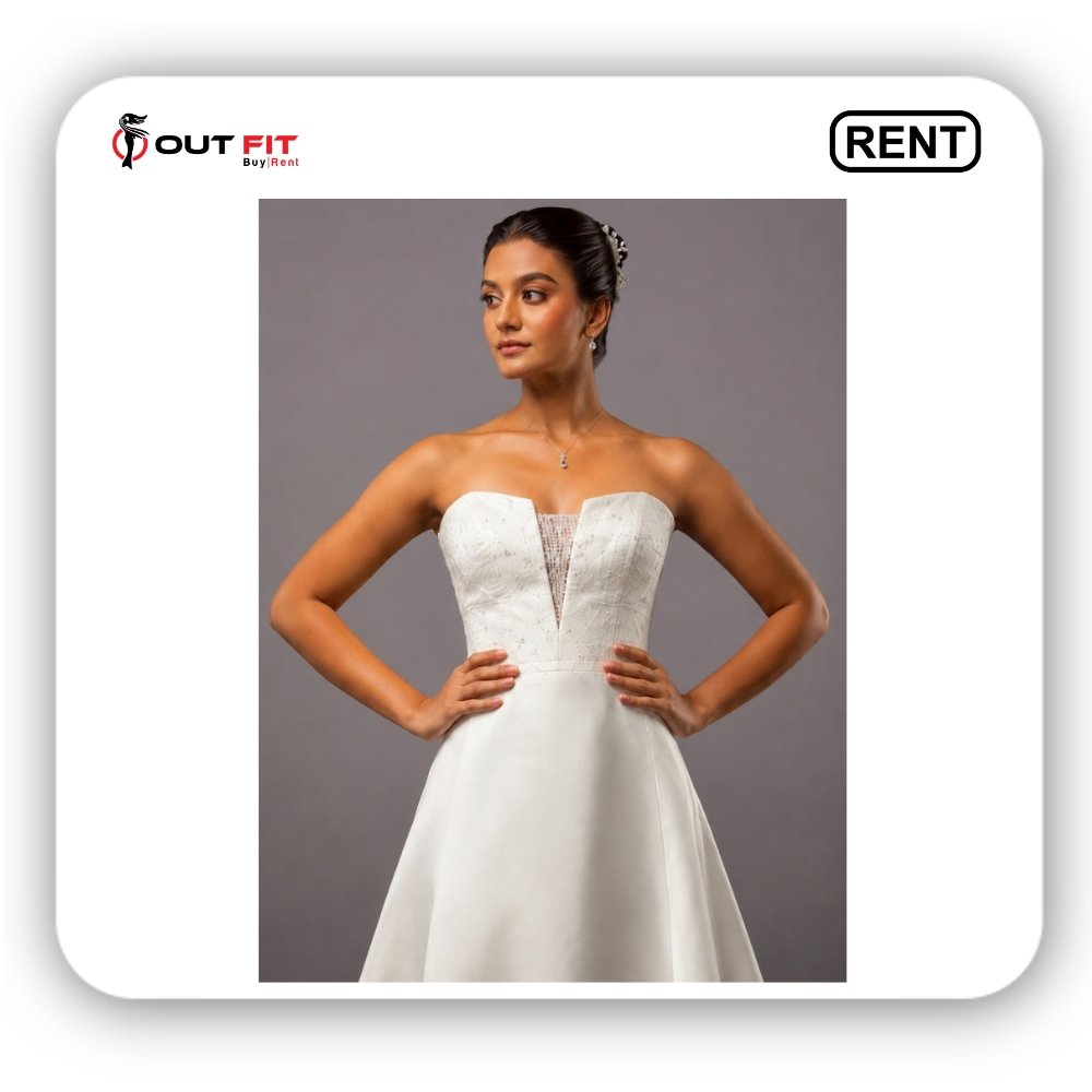 Elegant white off shoulder wedding dress hanging in Bangalore boutique Elegant white off shoulder wedding dress hanging in Bangalore boutique